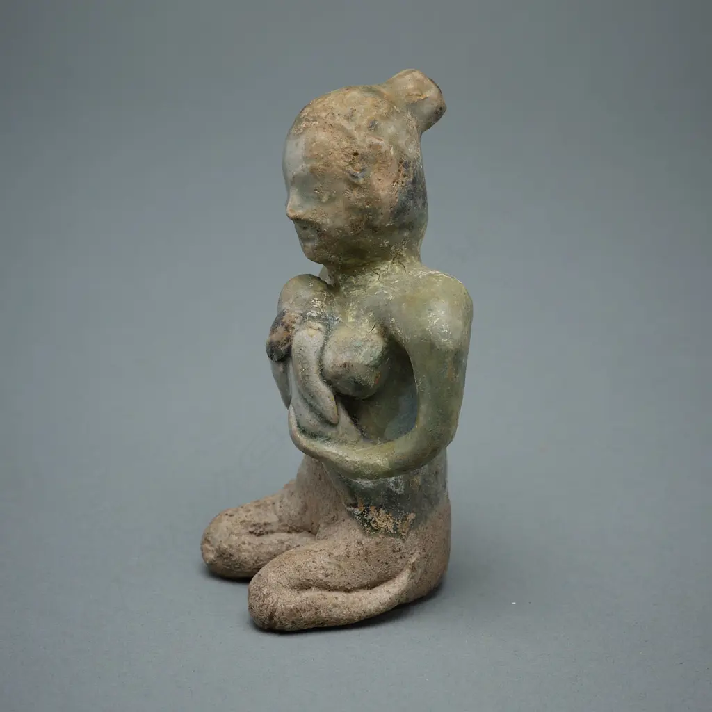A Sawankhalok stoneware figure (tukatha), Image 1++